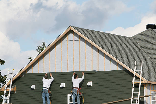Professional Emergency Siding Repair technician working in Eaton, OH